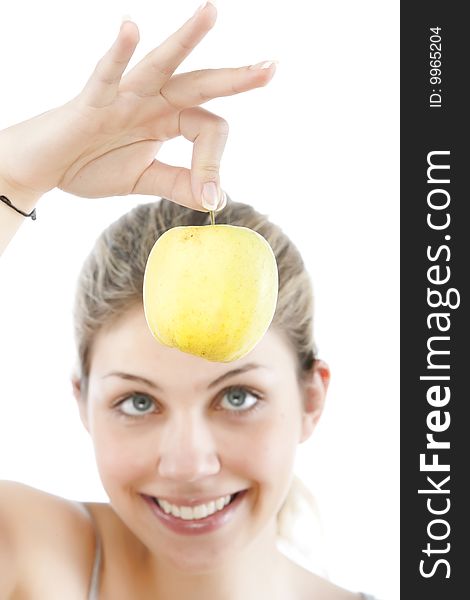 Beautiful young woman holding a  apple