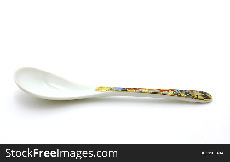 Spoon with patterns on a white background