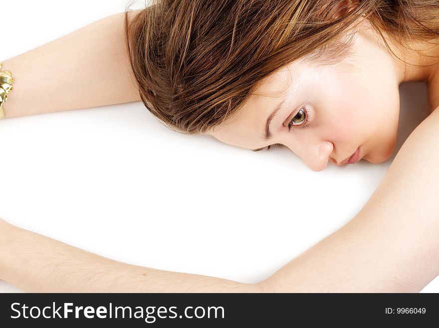 Beauty Girl Lying on a White Background