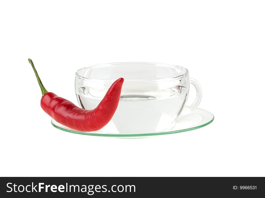 Cup of water with chili, isolated on white background