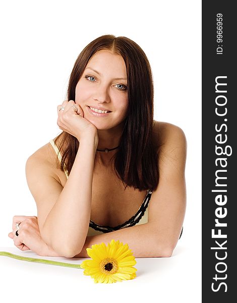 An image of a nice girl with a yellow flower
