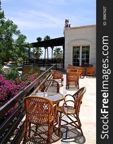 Tables and chairs of street cafe