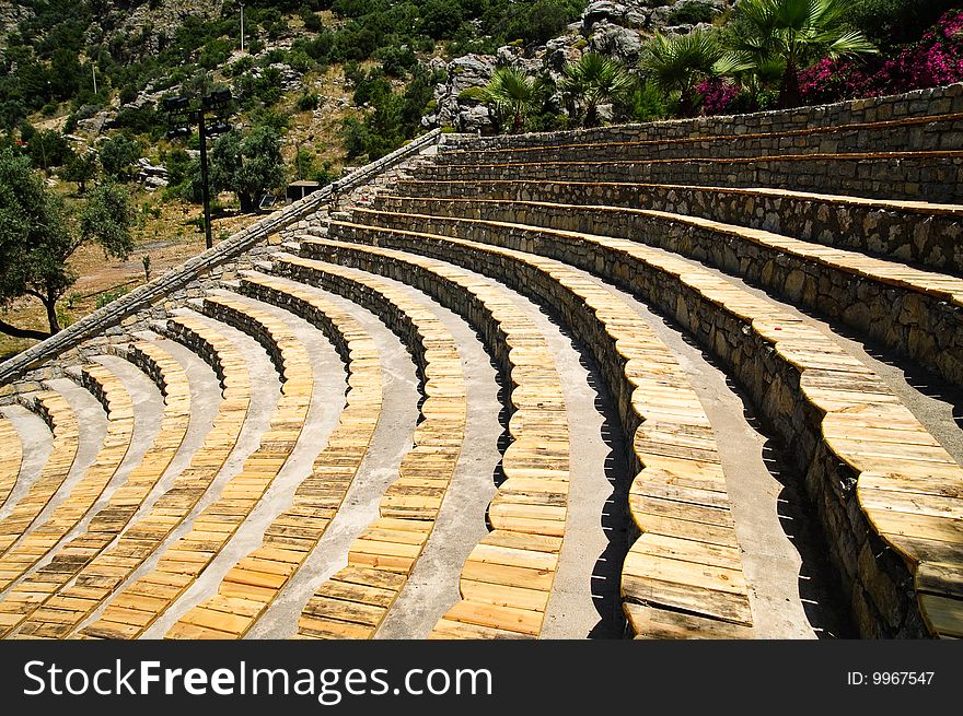 Wooden chairs of an outdoor amphitheatre