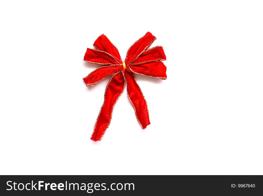 A red bow centred and isolated on a white background