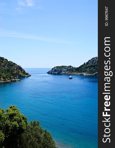 Rocky island in a tropical bay