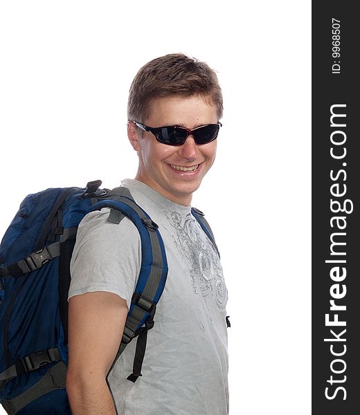 Young man with a rucksack and sun glasses. Young man with a rucksack and sun glasses