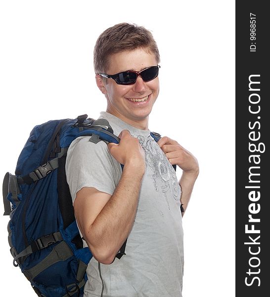 Young man with a rucksack and sun glasses. Young man with a rucksack and sun glasses