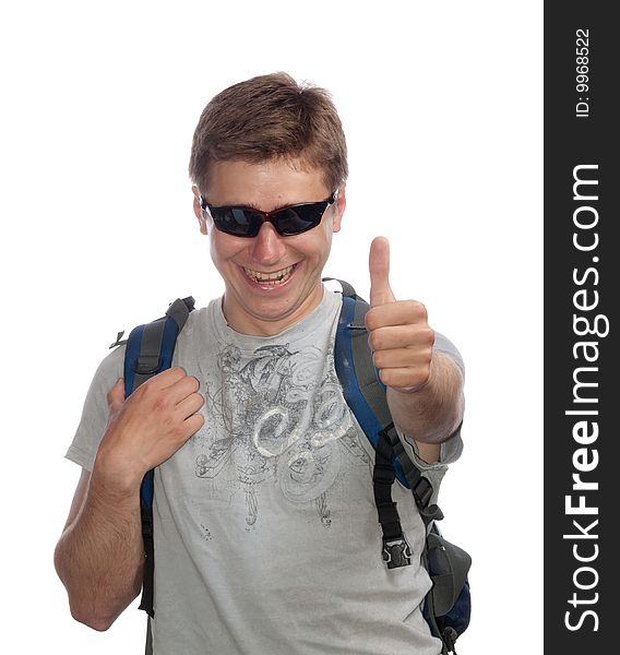 Young man with a rucksack and sun glasses. Young man with a rucksack and sun glasses