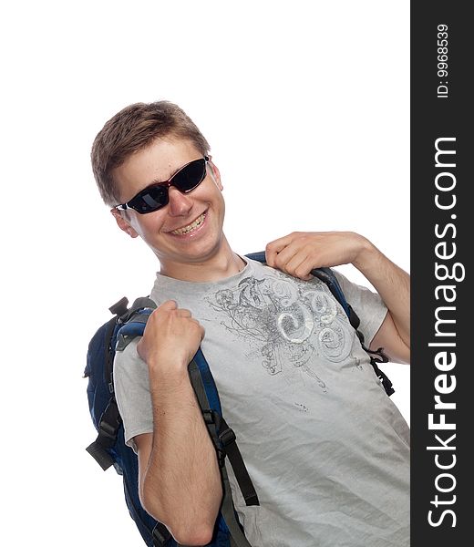 Young man with a rucksack and sun glasses. Young man with a rucksack and sun glasses