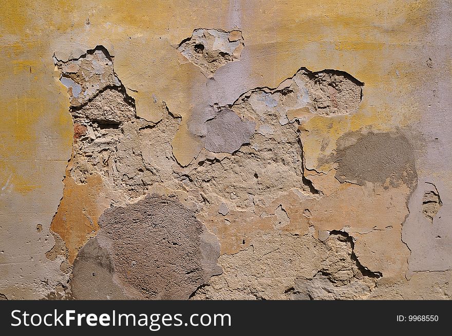 Antique rough ruined wall close up. Antique rough ruined wall close up