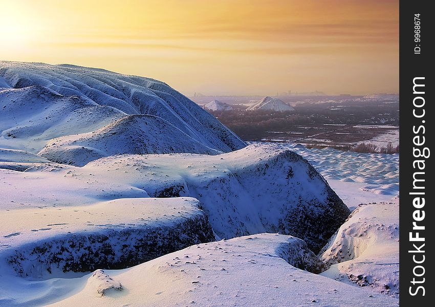 Colors of winter sunset of old mine. Colors of winter sunset of old mine