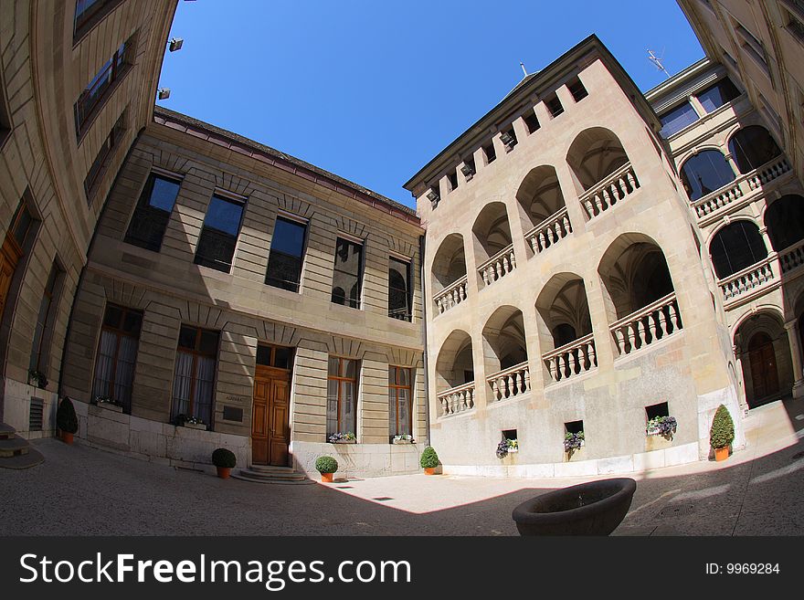 Atrium of a historical building in Geneva shot with a fish eye. Atrium of a historical building in Geneva shot with a fish eye.