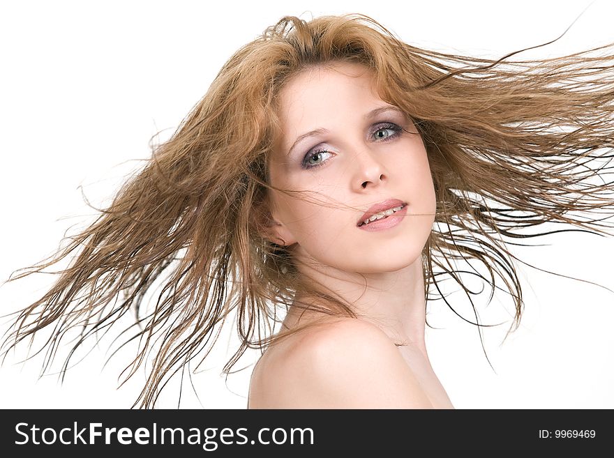 Happy young girl with long flying hair