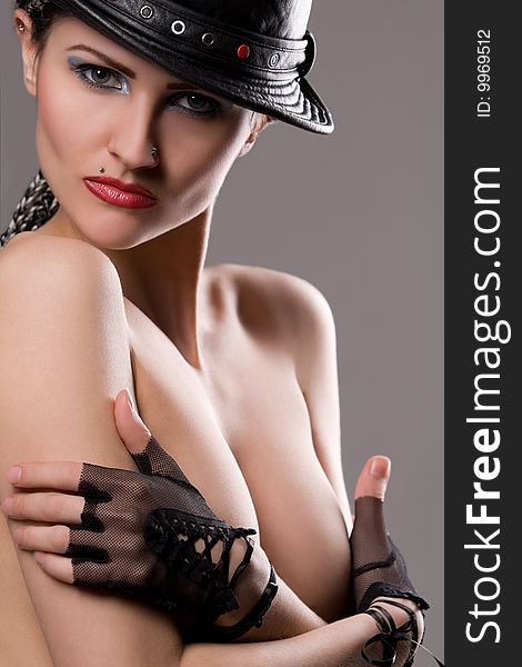 Beautiful Topless Model With Hat And Gloves