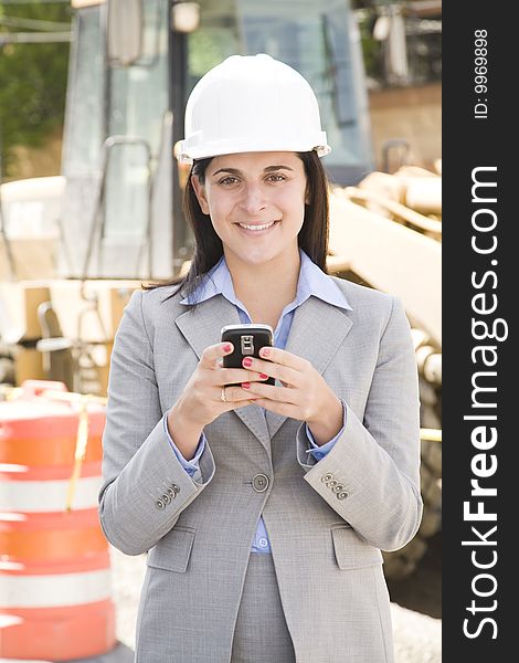 Female worker at a construction site. Female worker at a construction site