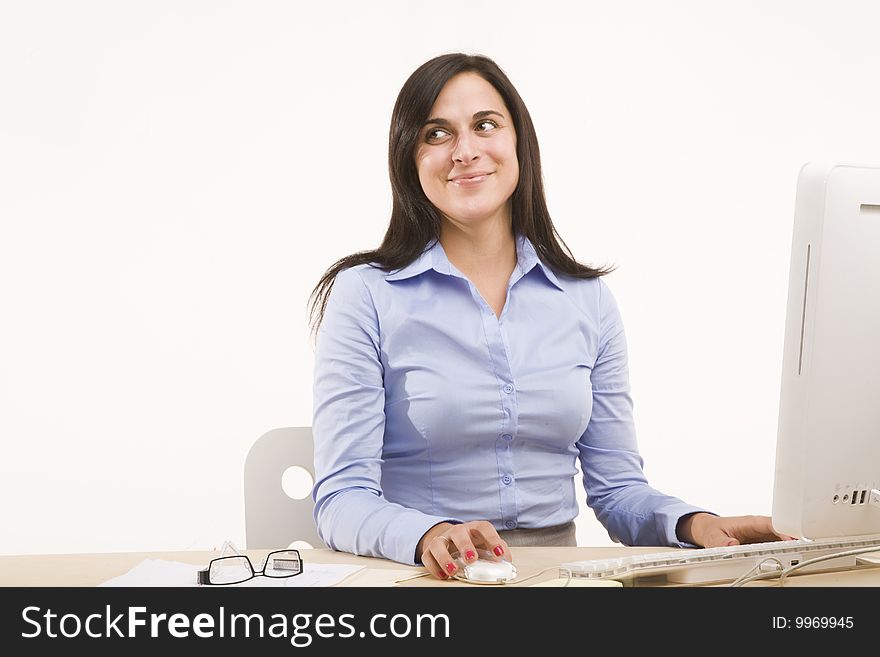 Professional woman sitting at desk. Professional woman sitting at desk