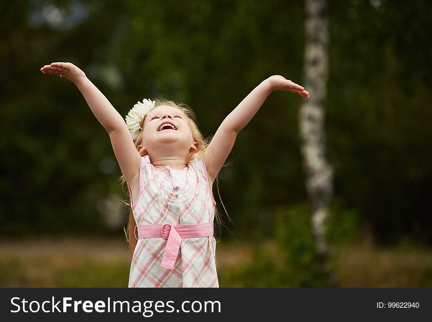 Young Girl Hands Up. Happy. Outdoors