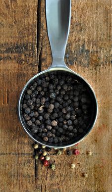 Black Peppercorns In A Metal Measuring Cup Stock Photo Black Peppercorns In A Metal Measuring Cup Stock Photo