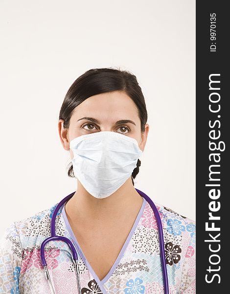 Female medical professional wearing partical mask. Female medical professional wearing partical mask
