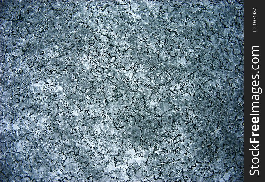 Ice crystals collected on a clear surface