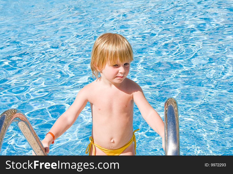 Little girl in the swimming pool