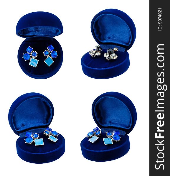 Earring in blue present box top view isolated