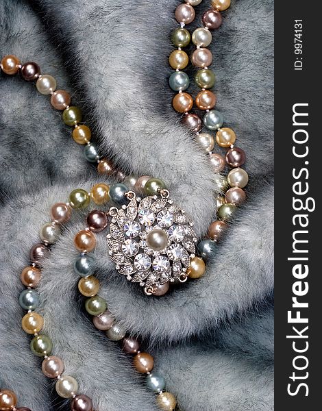 Nacklace with brooch on fur. Nacklace with brooch on fur
