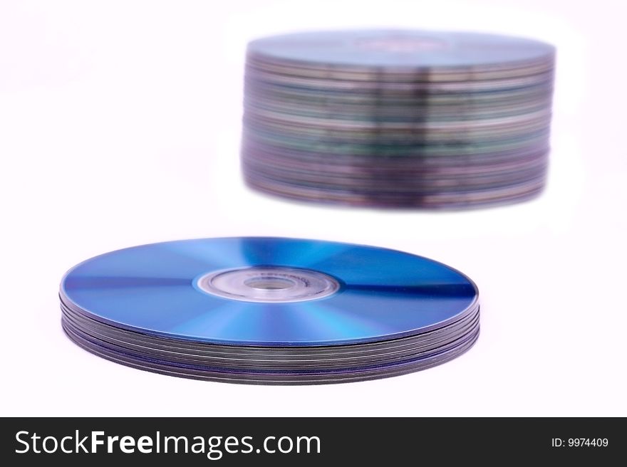 Stack of compact discs isolated on white background
