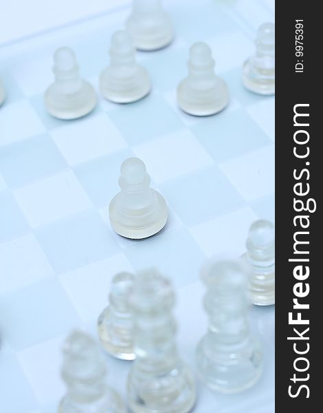 Transparent chess on a light blue background focusing on pawn