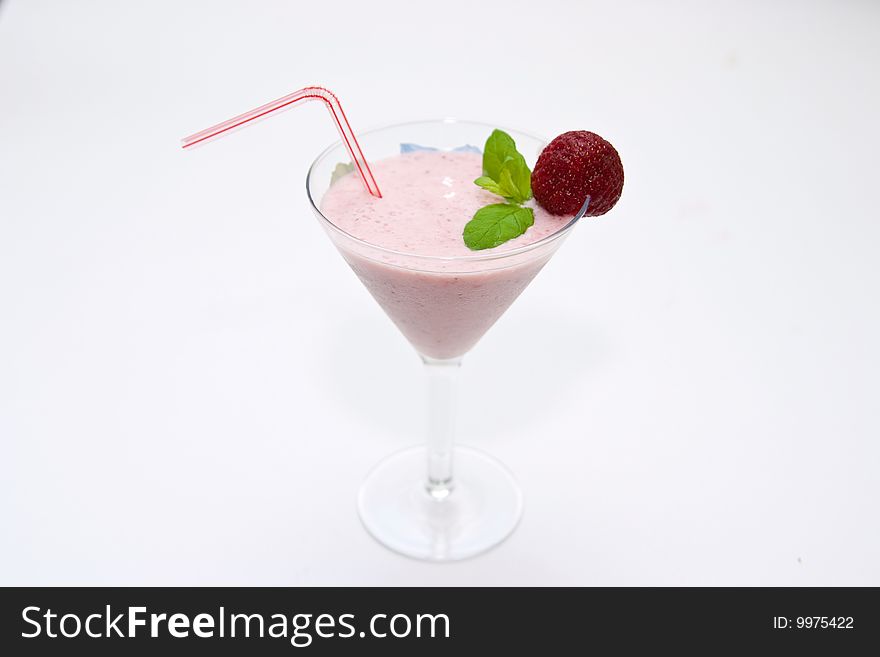 Strawberry smoothie decorated with mint and strawberry