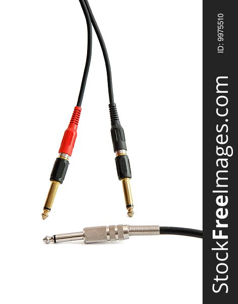 Red, black, silver and golden headphone plugs isolated