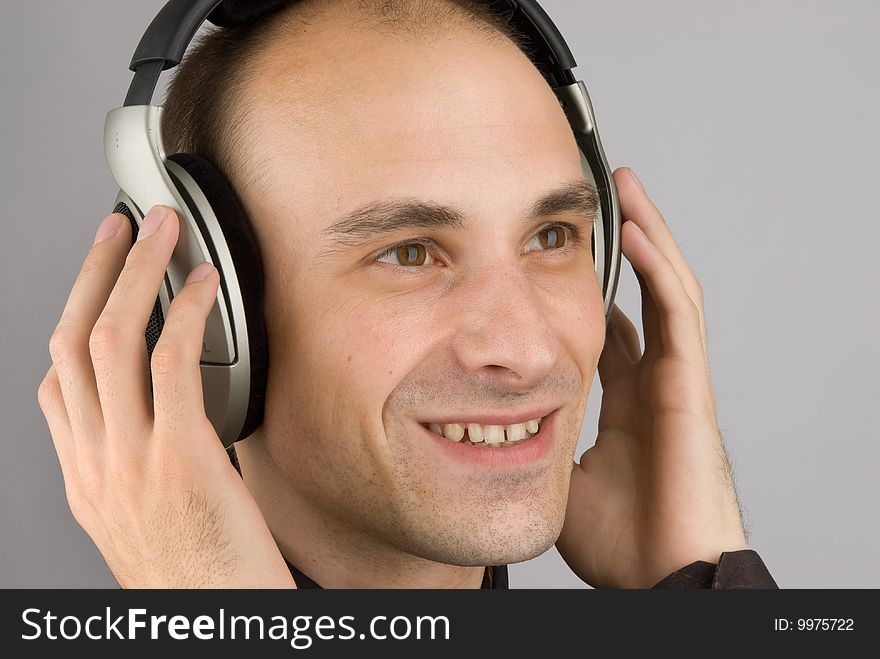 Man listening music in headphones