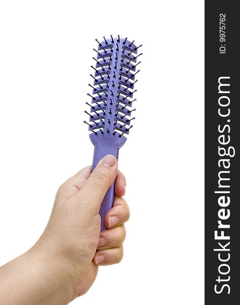 Hand Holding Purple Hairbrush Isolated On white Background
