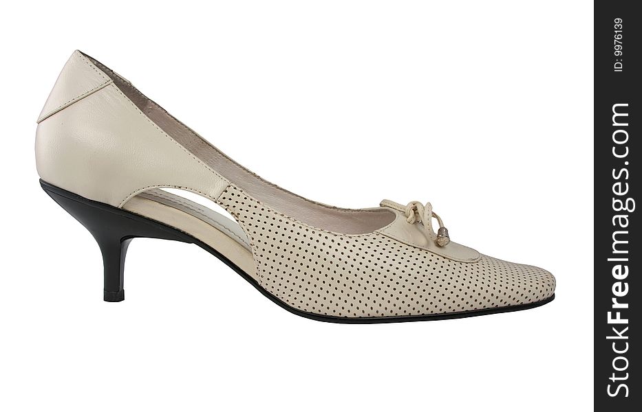 Female shoe of beige colour on a white background