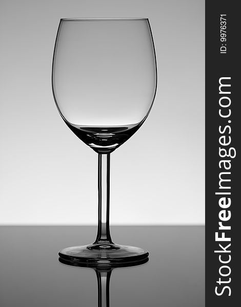 Wineglass with reflection and backlight