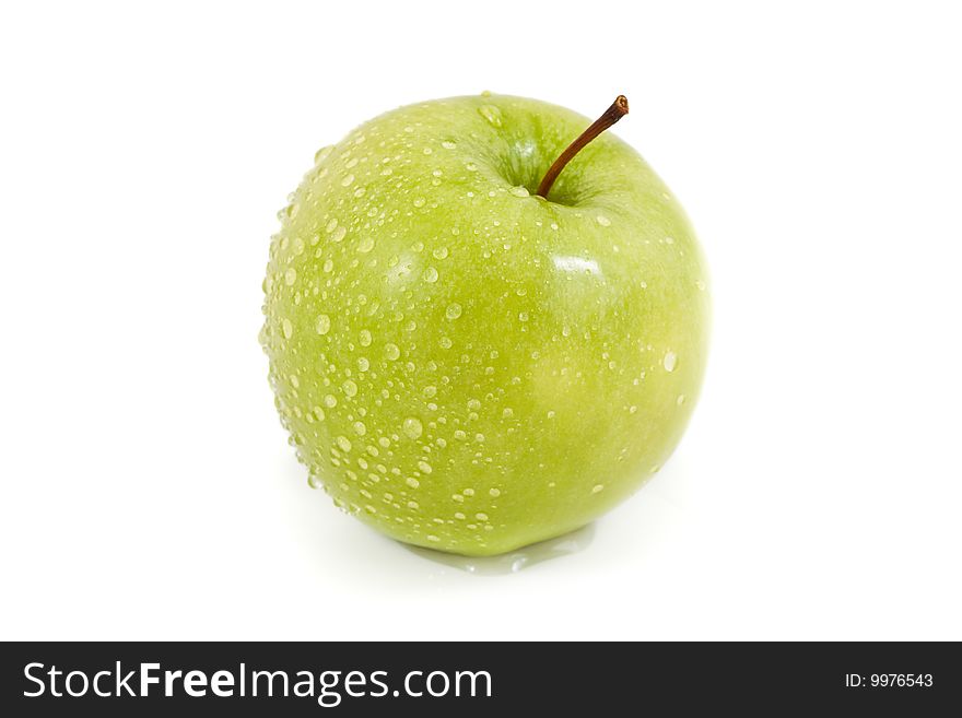 Green apple with droplets isolated on a white background