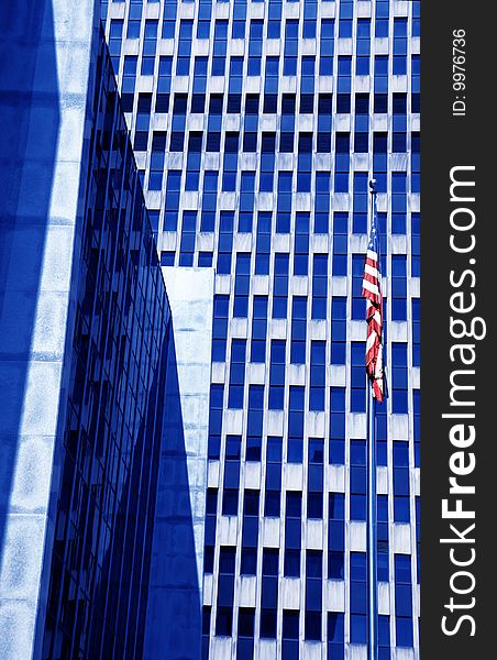 American building with flag colored by blue