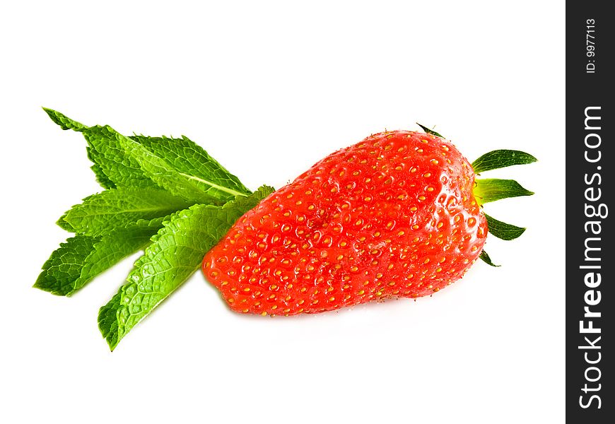 Ripe strawberry with a fresh leaf of mint on a white background