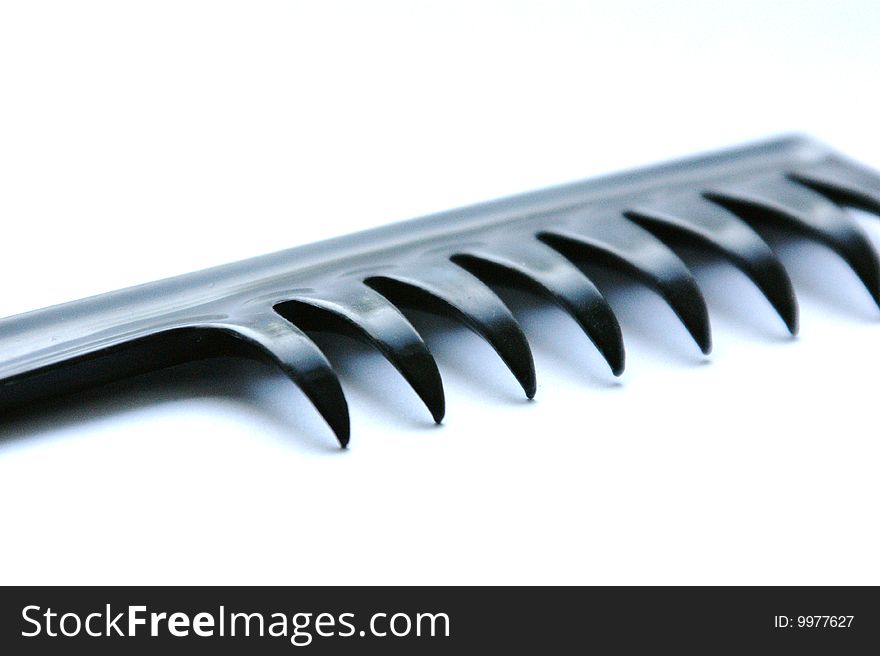 Hairbrush black on a white background