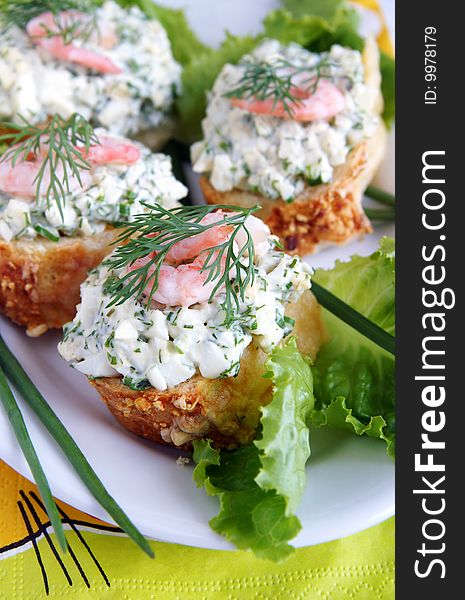 Healthy enrich sandwiches with shrimps, boiled eggs, green vegetables and herbs, blur background, vertical