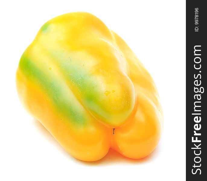Yellow pepper close up isolated on a white background