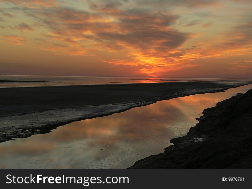 Beginning of day over a salt lake in Tunisia