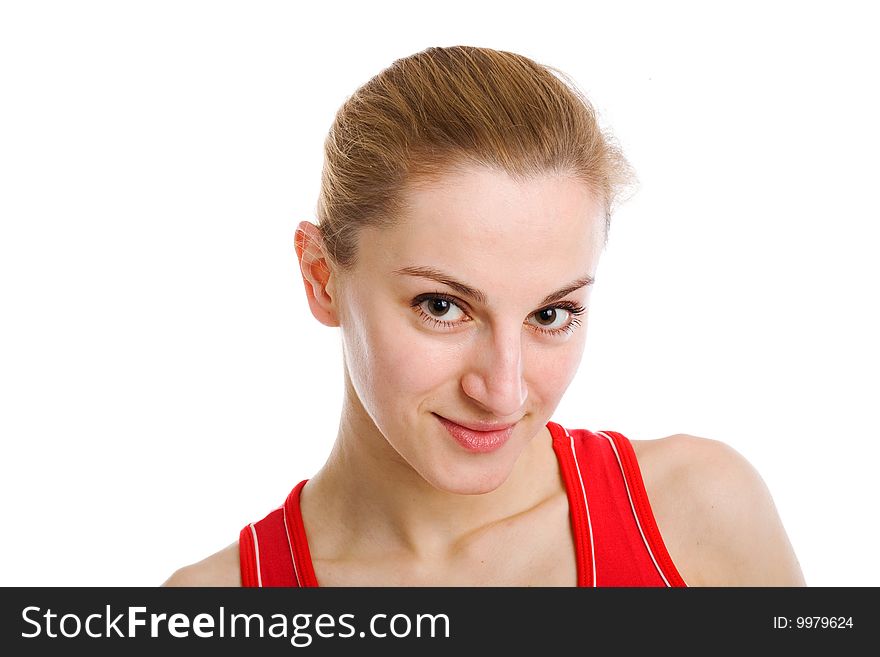 A smiling sporty woman in red leotard posing on a white background. A smiling sporty woman in red leotard posing on a white background