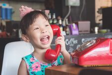 Girl Smiling While Talking With Her Friend By Phone Stock Photos