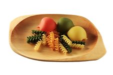 Coloured Pasta On Wooden Plate Stock Photography Coloured Pasta On Wooden Plate Stock Photography