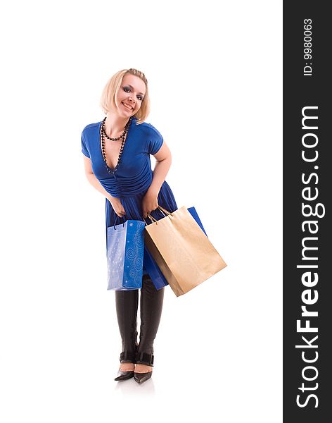 Happy beautiful young woman with shopping bags