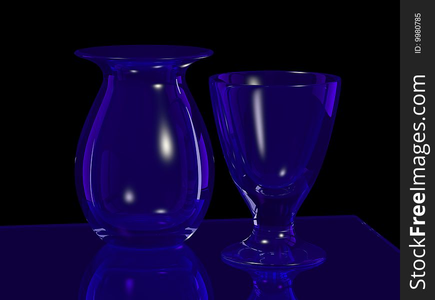 Blue glass vase and goblet on black