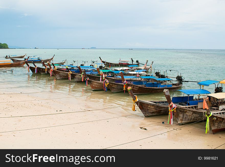 Group of longtail boats near one of the Thailand islands. Group of longtail boats near one of the Thailand islands