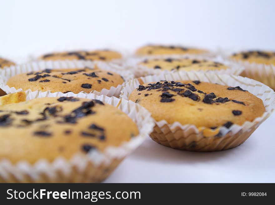 Baked cakes with chocolate flakes