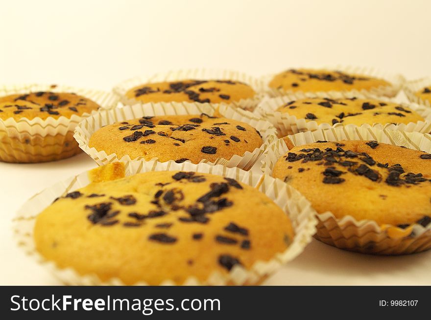 Baked cakes with chocolate flakes